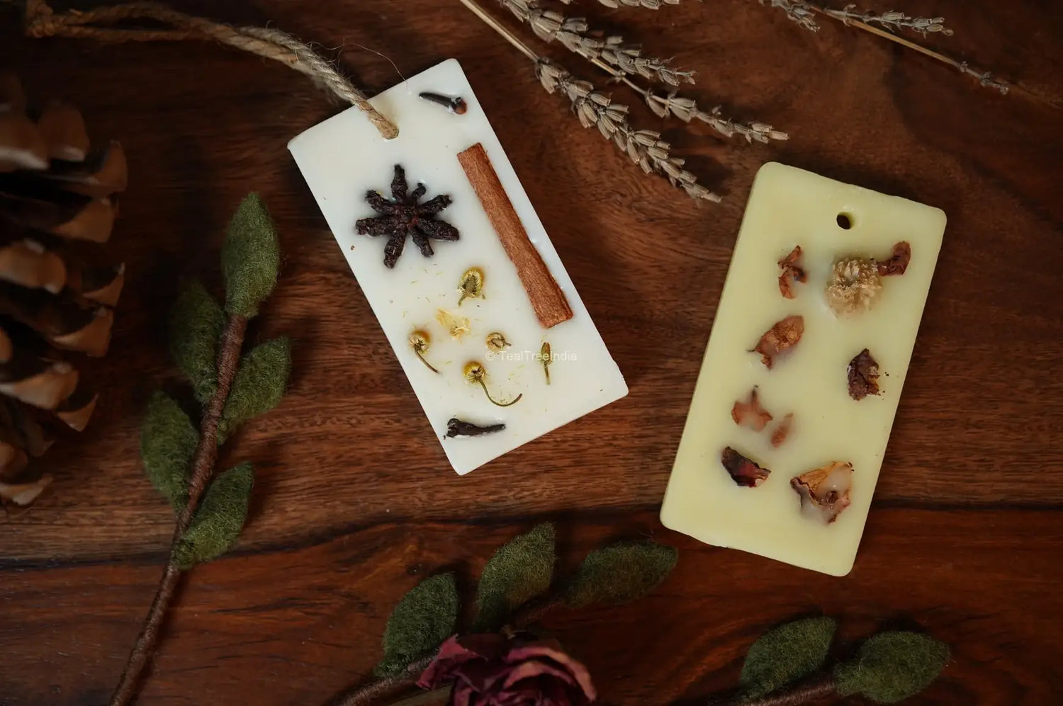 Herbal wax aroma tablets infused with spices like cinnamon and cloves, styled with botanicals on wood.